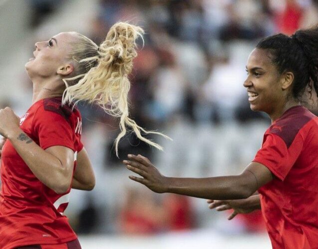 Swiss Alisha Lehmann, left, celebrates after scoring to 1:0 next to teammate Coumba Sow, during the FIFA Women's World Cup 2023 qualifying round group G soccer match between Switzerland and Lithuania at the Stockhorn Arena in Thun, Switzerland, on Friday, September 17, 2021. (KEYSTONE/Alessandro della Valle)