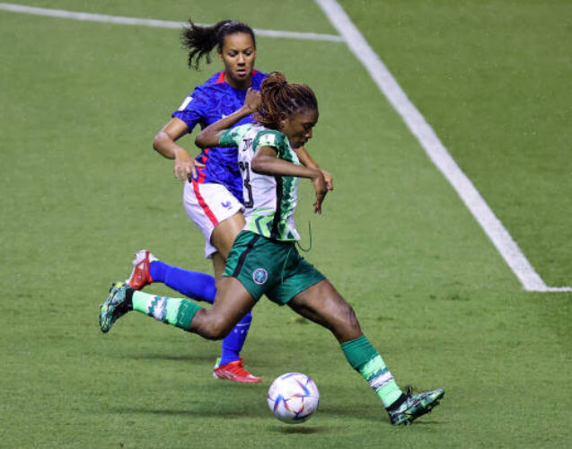 SAN JOSE, COSTA RICA - AUGUST 11: Mercy Idoko of Nigeria fights for the ball with Anaelle Tchakounte of France during the FIFA U-20 Women's World Cup Costa Rica 2022 group C match between France and Nigeria at Estadio Nacional de Costa Rica on August 11, 2022 in San Jose, Costa Rica. (Photo by Buda Mendes - FIFA/FIFA via Getty Images)